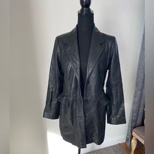 Vintage 90s leather mid length jacket.